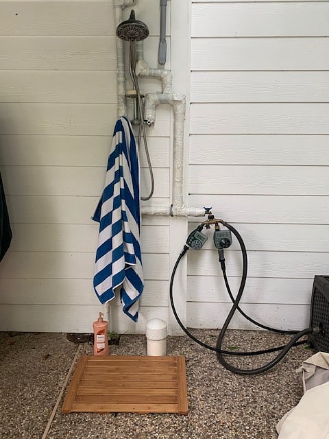 exterior shower by the pool ( warm water)