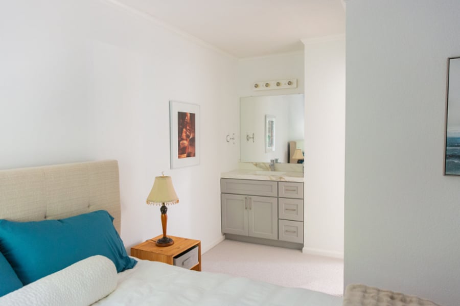 Master bedroom with sink and vanity