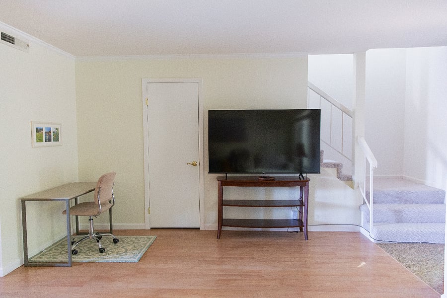 Living room w/big screen TV.