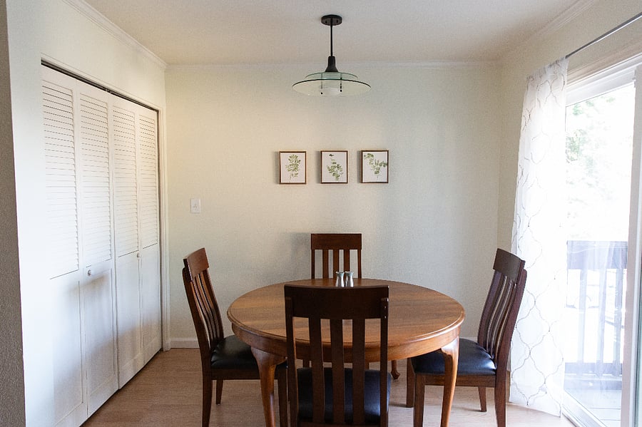 Dining room with laundry to the left.