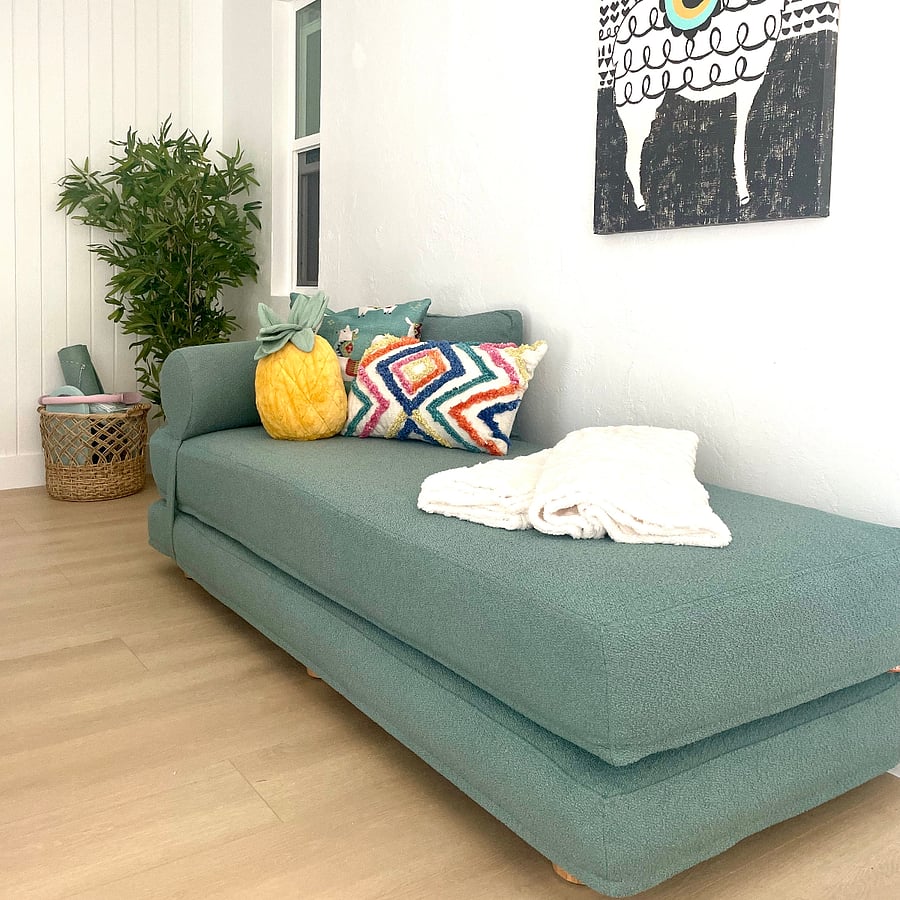 Comfortable day bed that doubles as a sleeping space for extra overnight guests