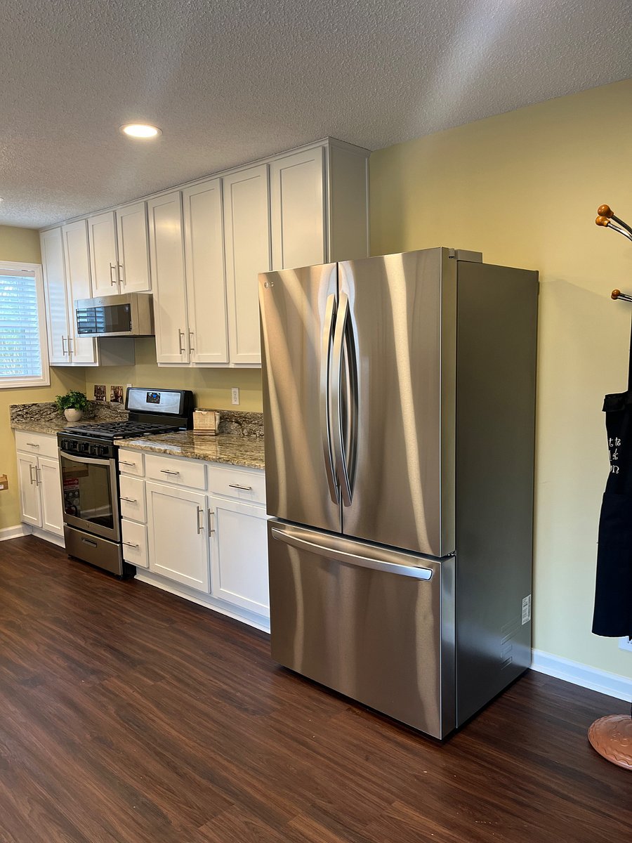 Gas stove, microwave & full size refrigerator.