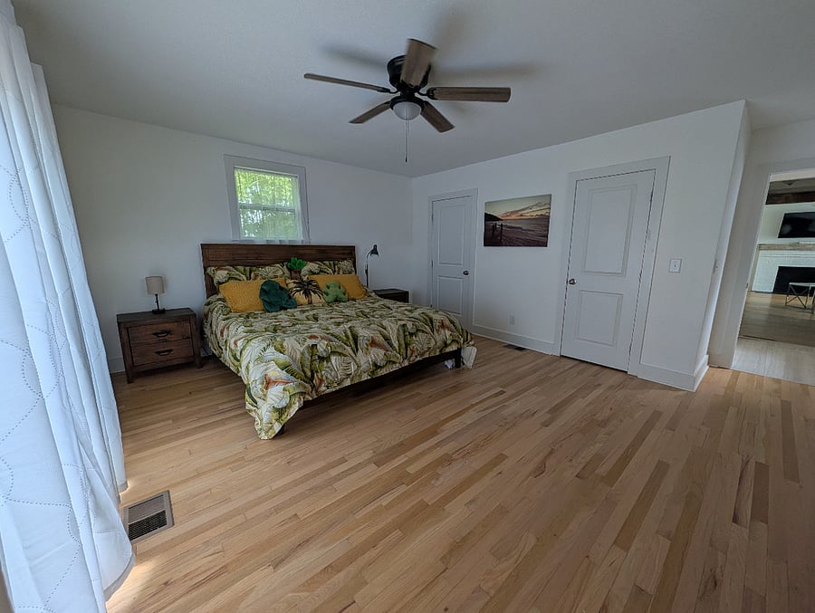 Master bedroom looking toward closet and bath doors.