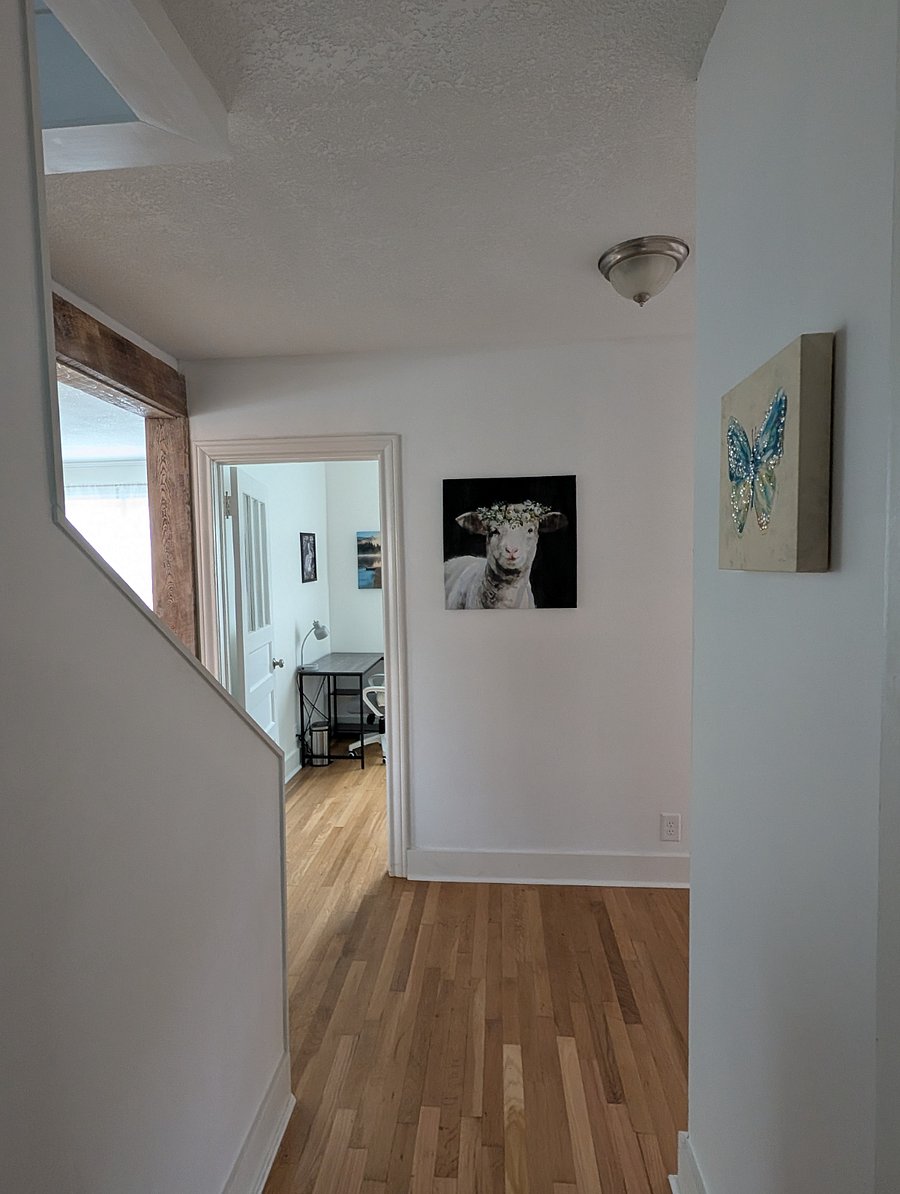 Hall looking into third room.