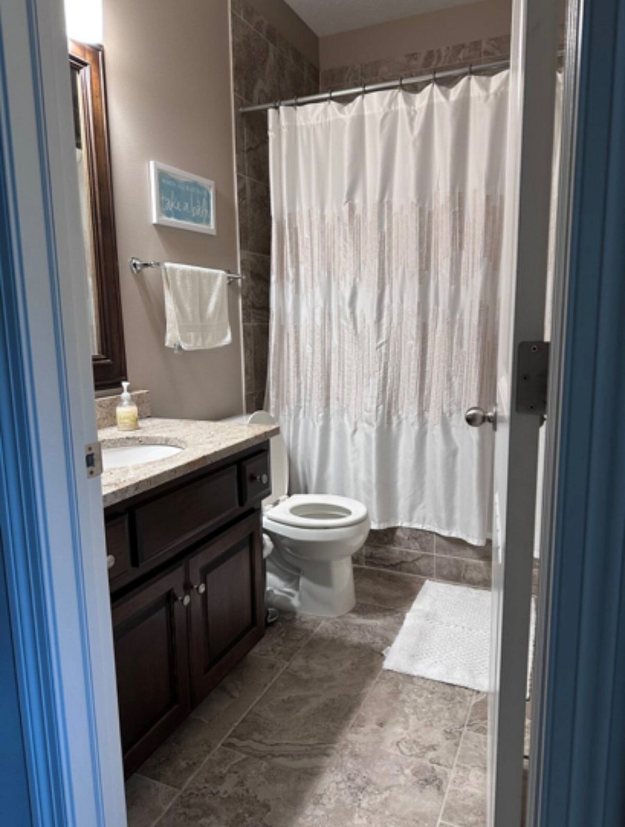 bathroom is adjacent to room