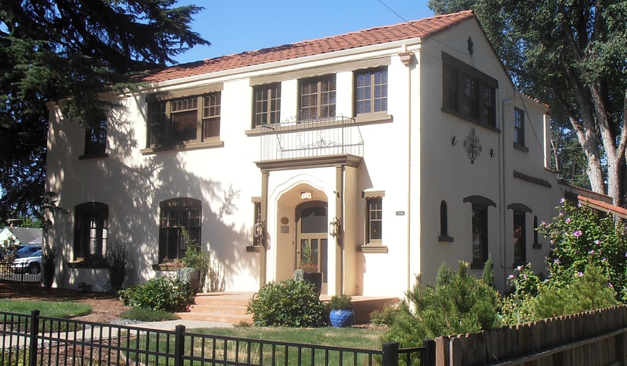 Front entrance used by owners. Private seating/patio to the right of the house.
