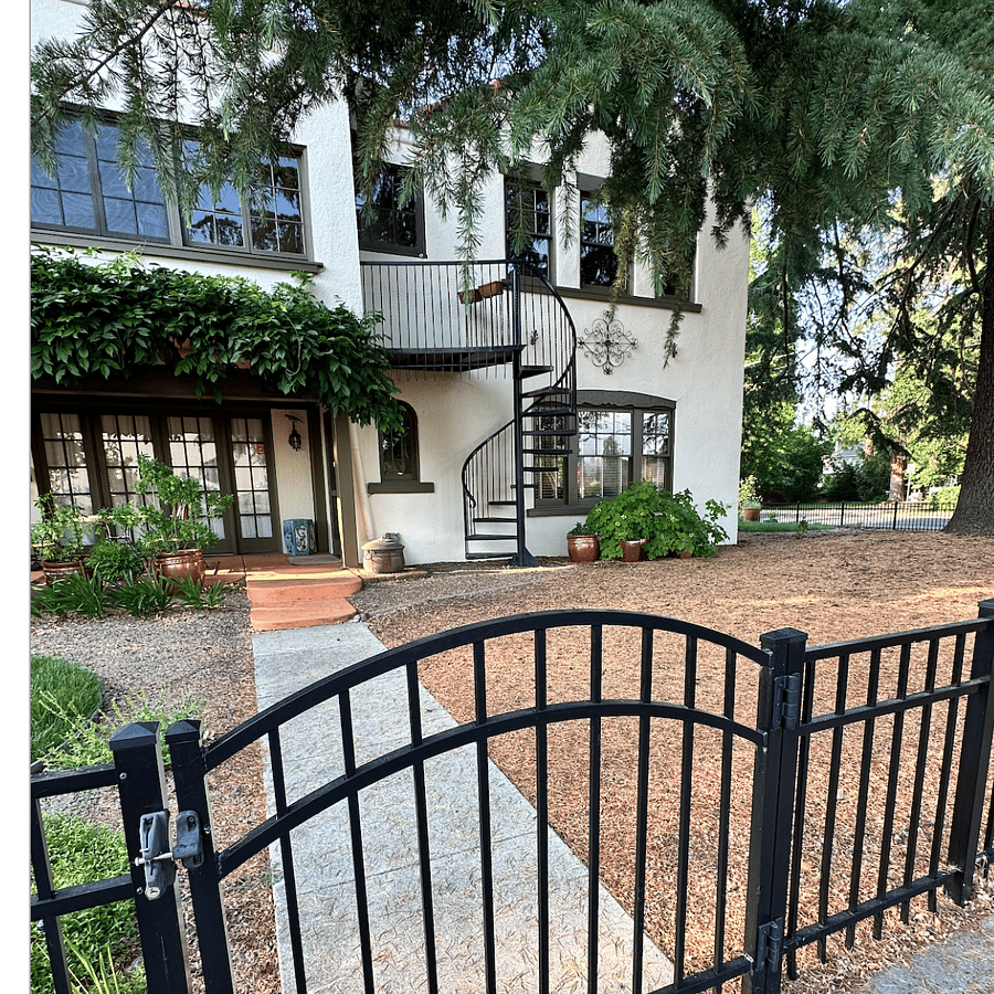 Spiral staircase is your private entrance. It leads to the sunroom which serves as your entry space. Three interior stairs take you into the living space (library).