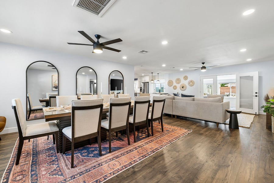 Bright, open-concept living and dining area perfect for group gatherings and relaxing in style.
