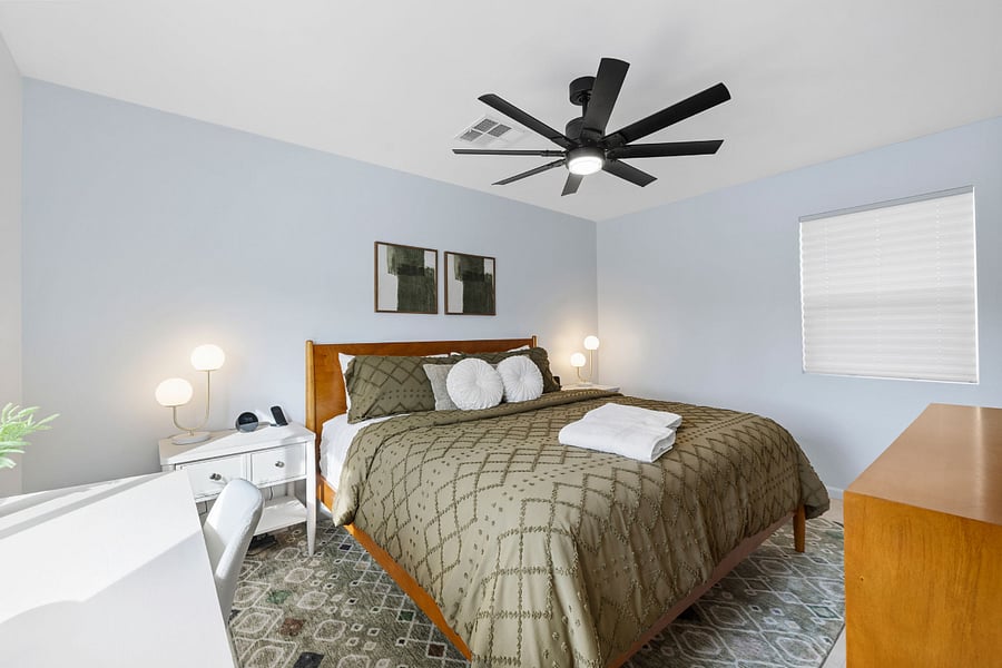 This casita bedroom features a king-size bed, workspace, blackout shades, and a high-end hybrid mattress for a quiet, comfortable nights sleep just steps from the pool.