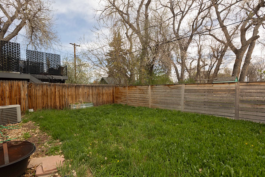 Fenced yard for pets and bonfires