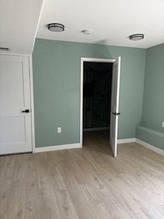 Lower level bedroom with attached bathroom