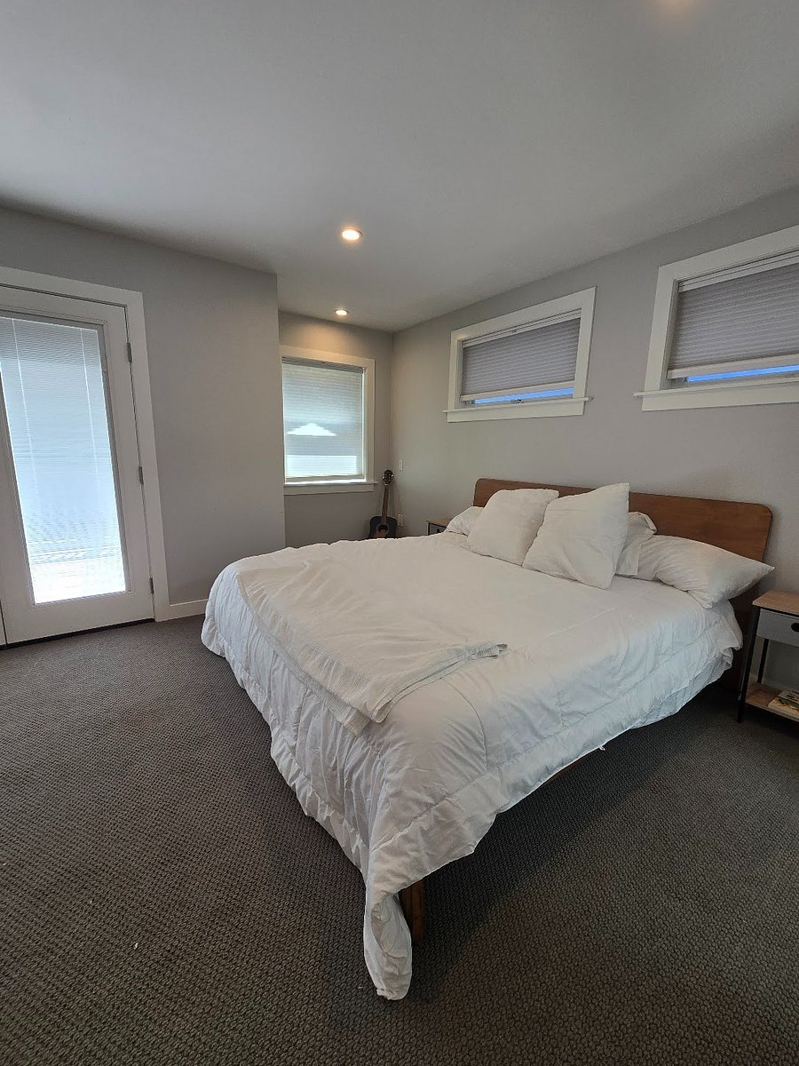 King sized bed in primary suite.