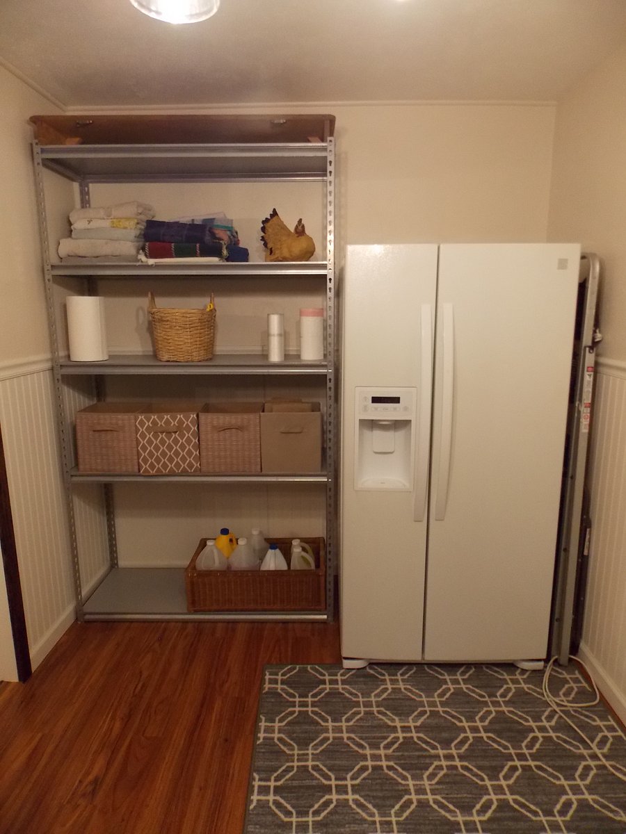 Laundry room storage with secondary refrigerator/freezer