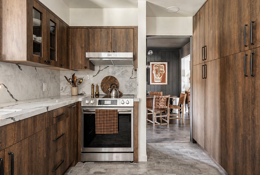 Shared Kitchen Nook: A cozy corner for morning coffee, meals, or focused work. Set beside a sunny window, this space offers a quiet moment to reset and recharge
