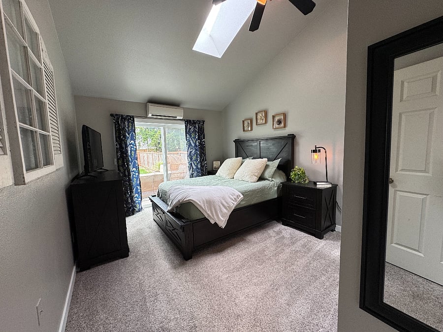 Private Bedroom with closet, dresser storage, full length mirror & sliding glass door to the patio!