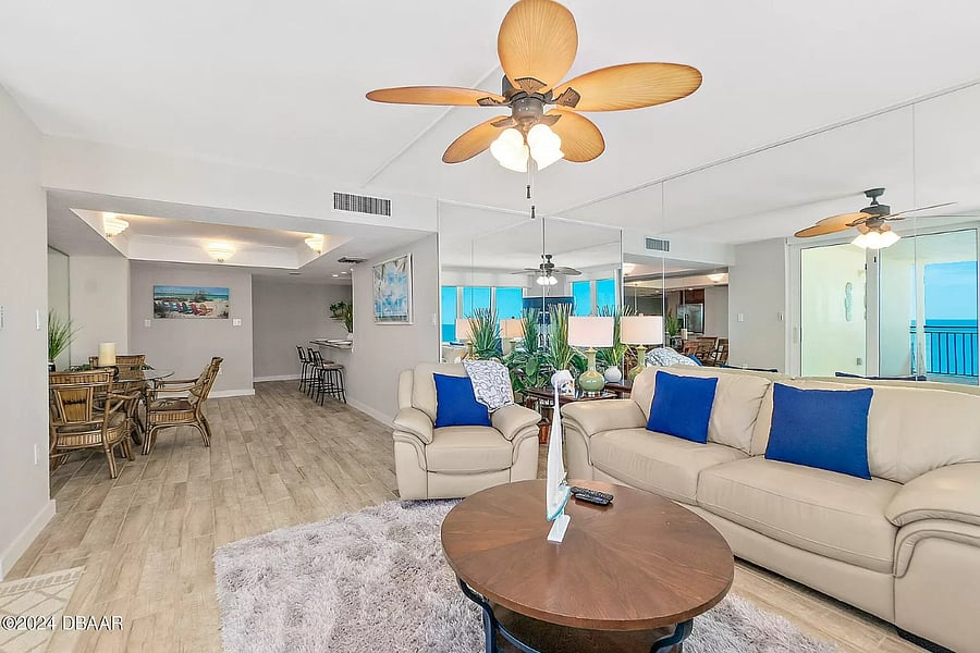 View of living room. dining area, and kitchen