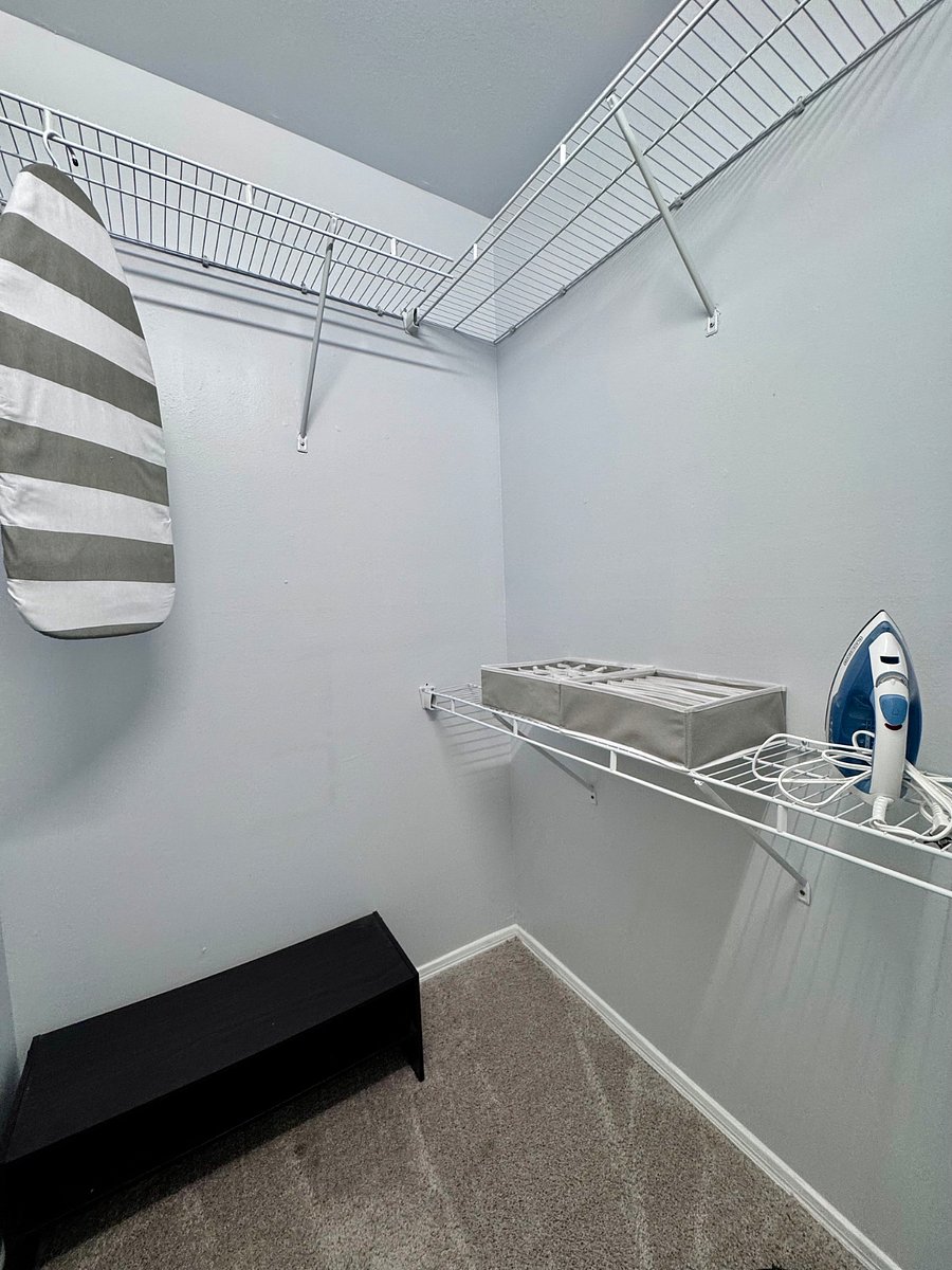 Plenty of closet space with shelves and clothes hangers included.