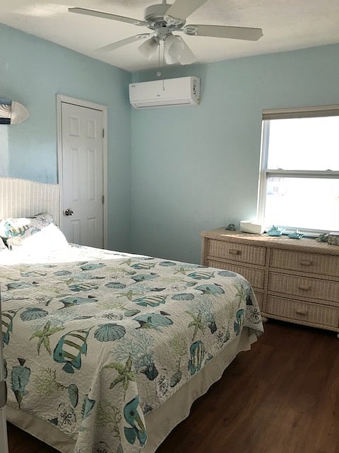 Queen Room-Queen Size Bed, small TV/DVD player, full size dresser, one end table, mini-slit AC unit, ceiling fan