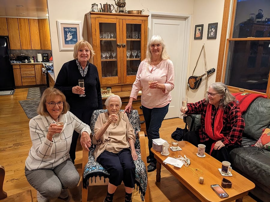 We are toasting my mum on her birthday. She does not live here.