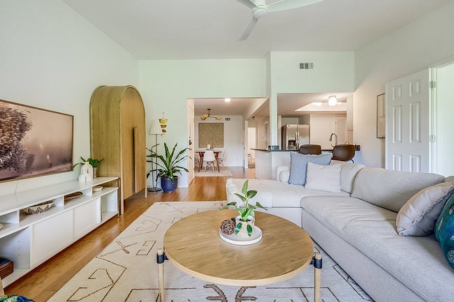 Open layout. Looking from living room to kitchen and dining room.