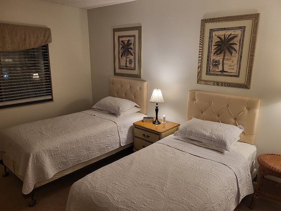dual twin beds in second bedroom