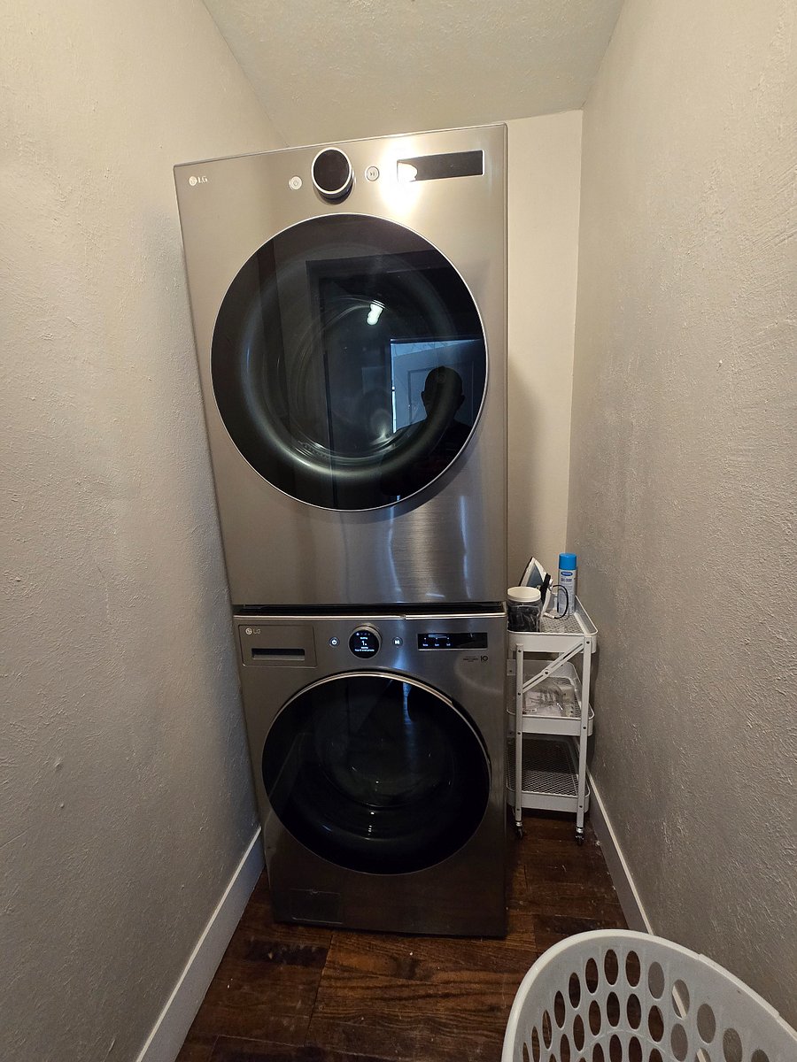 Nice Full Size Stackable Washer and Dryer at your service. Wrinkle free drying if needed.