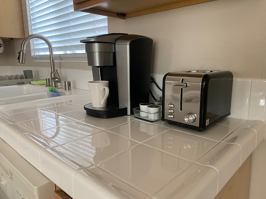 A multifunctional coffee maker offers both a traditional drip option and K-Cup compatibility, so you can enjoy your favorite brew just the way you like it.