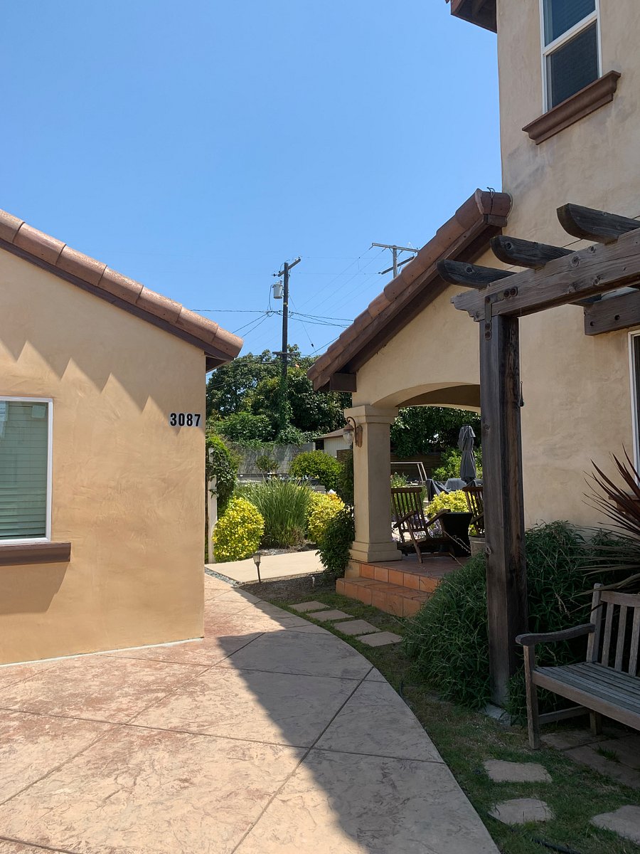 View of the main house (right) in relation to the two-bedroom house (left). Each home is fully independent, offering privacy and separate living spaces.