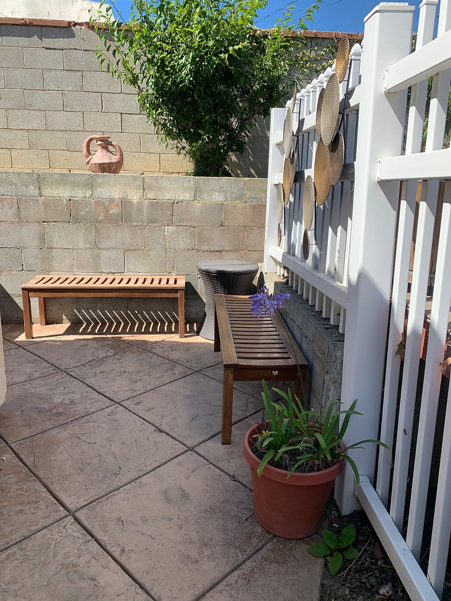 Private area on the back of the house with a small BBQ area.