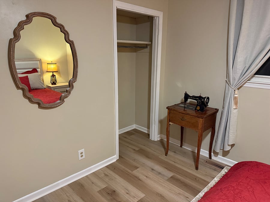 The closet provides additional storage, and has a door now, too.