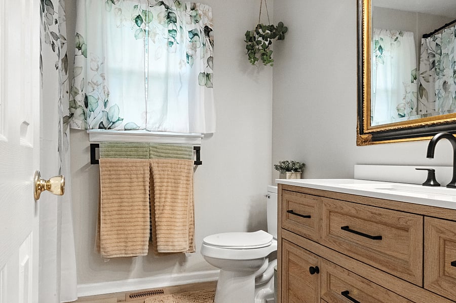 The bathroom provides a calming, spacious environment to prepare for your day.