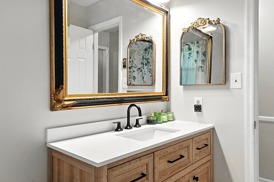 The bathroom has a closet, medicine cabinet, and brand new vanity, providing plenty of storage.