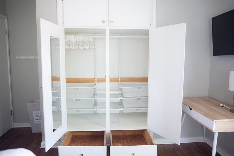 Elfa closet system in king bedroom