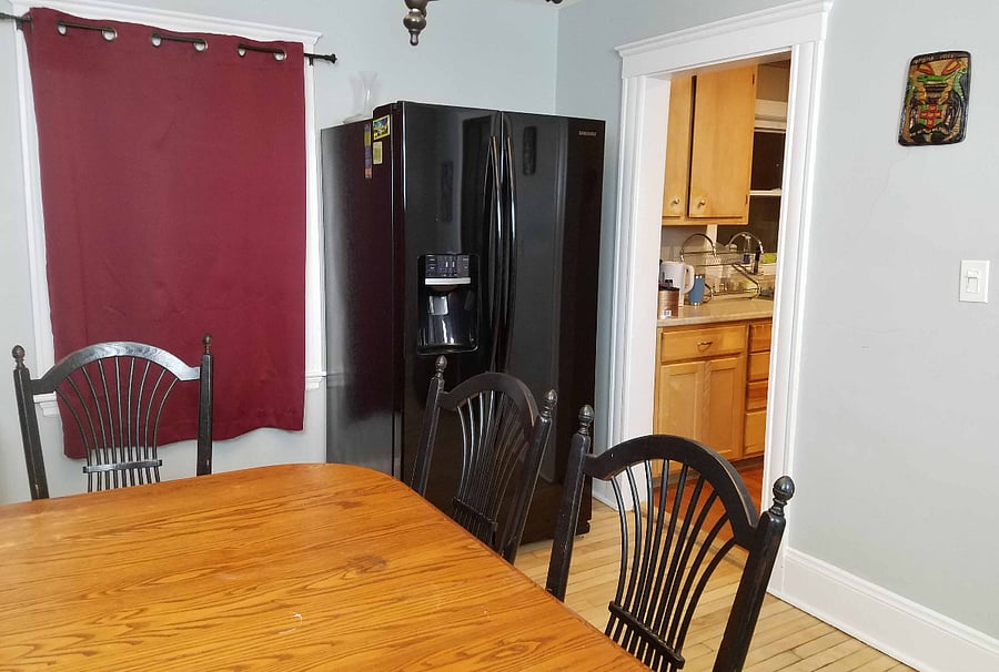 Dining Room. Sharing house with 4 other people so we have a fridge in this room.