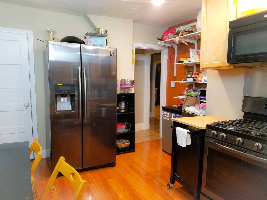 Kitchen with shared appliances, pots & pans, dishes, glasses and silverware. Personal storage for food in the cupboards.