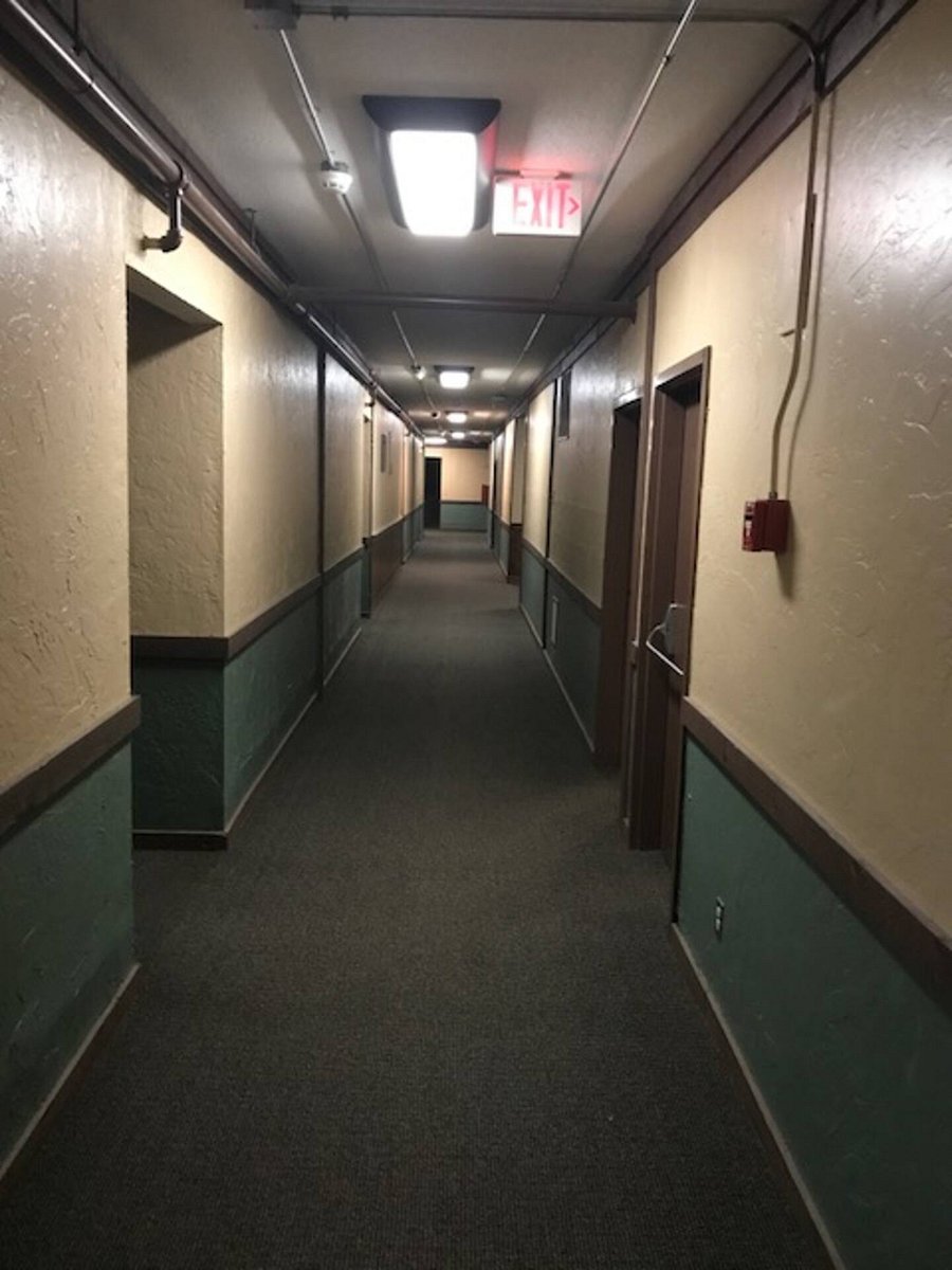 Hallway from condo to washer & dryer and trash disposal!