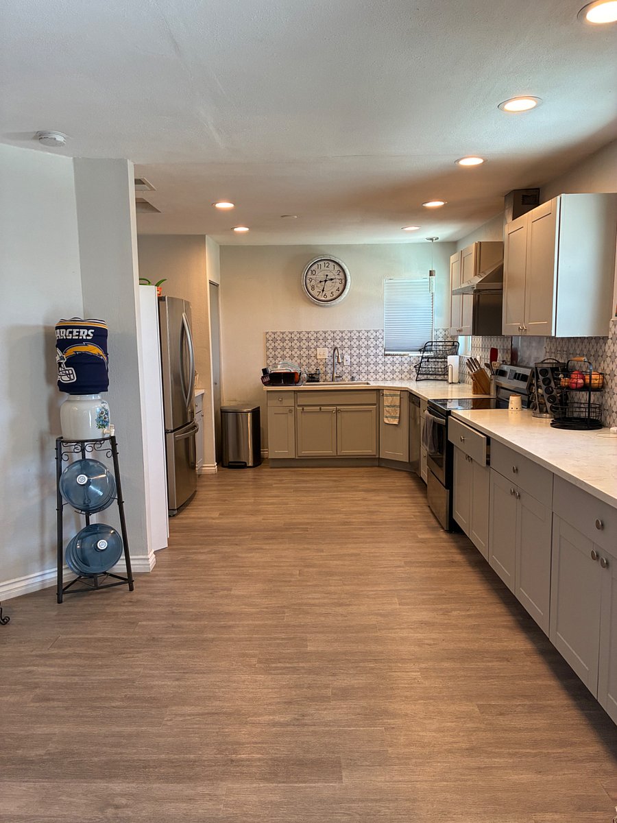 Full kitchen equipped with a full size refrigerator, electric stove and oven, dishwasher and all the cooking utensils you may need to whip up a home cooked meal. 