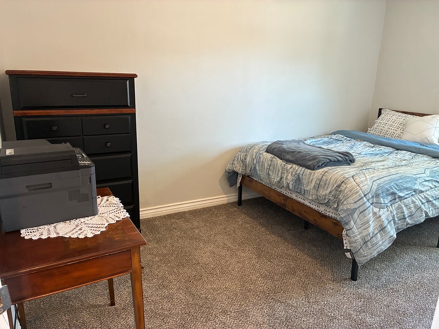 Bedroom 1 includes a desk and workable printer for your work or school needs. 