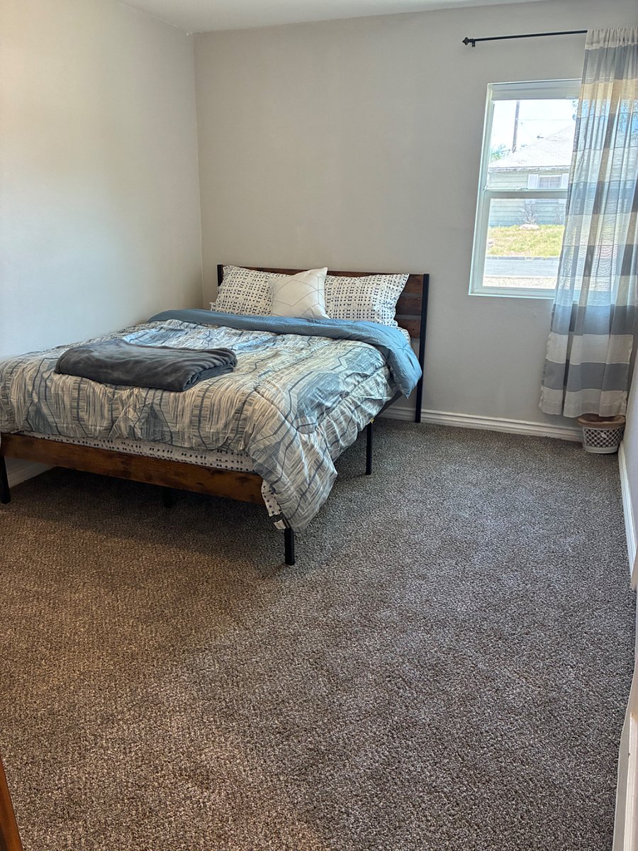 Bedroom 1 features a Queen size bed. 