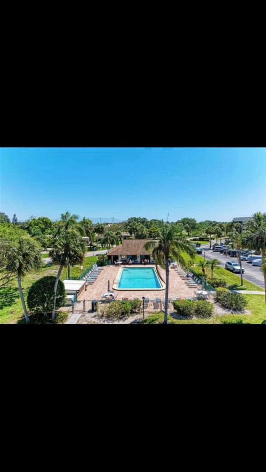 Swimming pool just across parking lot from the condo.