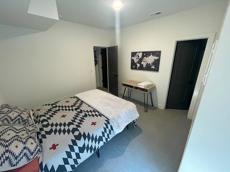 Basement bedroom, aka the third bedroom. 