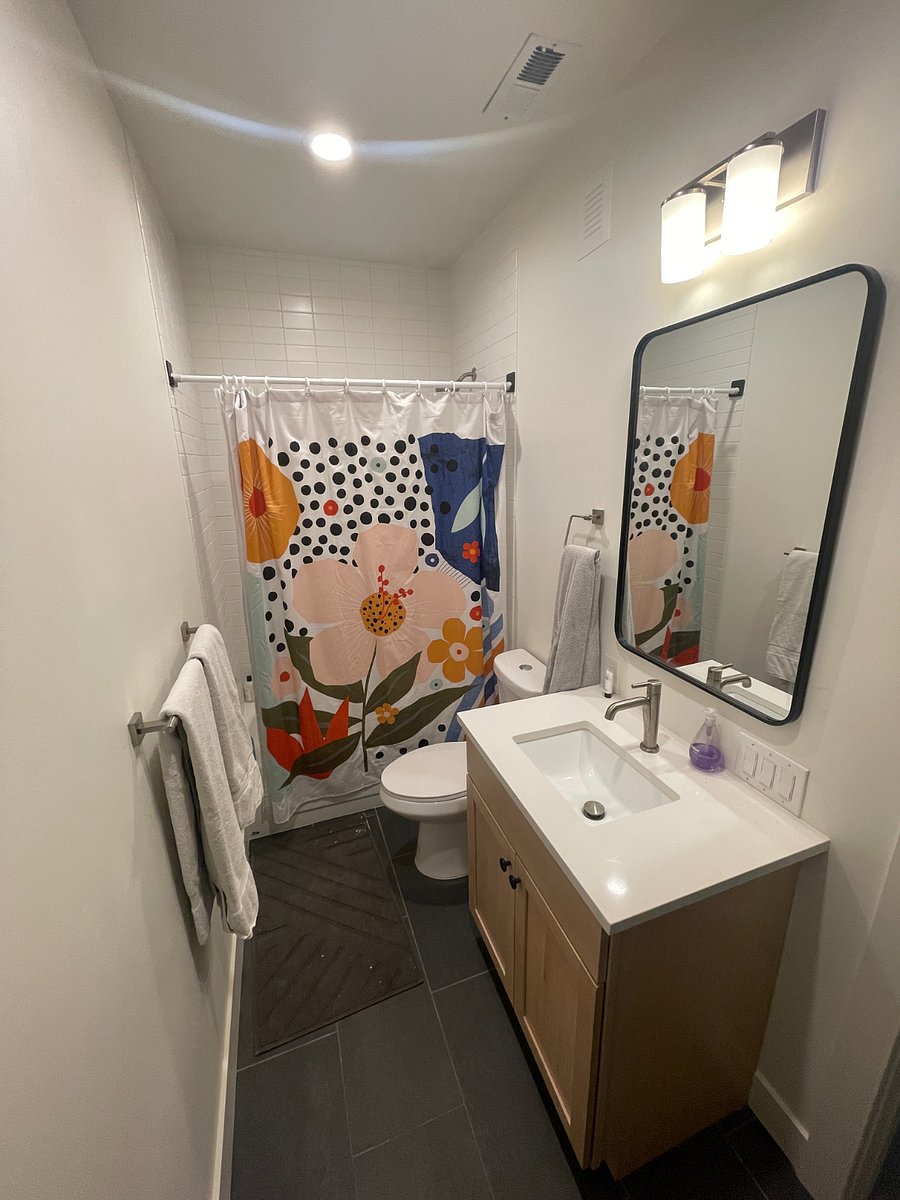 Basement Bathroom, with tub / shower / regular bathroom stuff. 