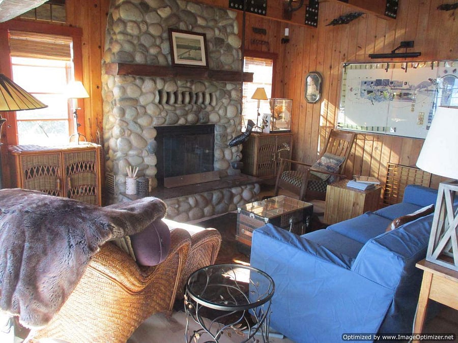 Liviing Room with River Rock Wood Burning Fireplace