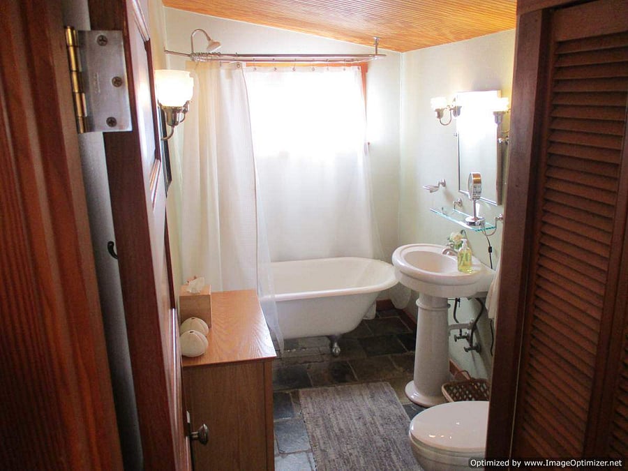 Downstairs Bathroom with Claw Foot Tub and Shower
