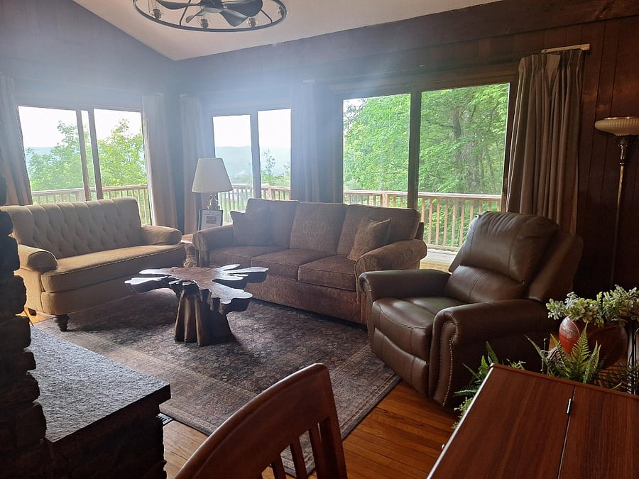 Living room with view of apple orchard.