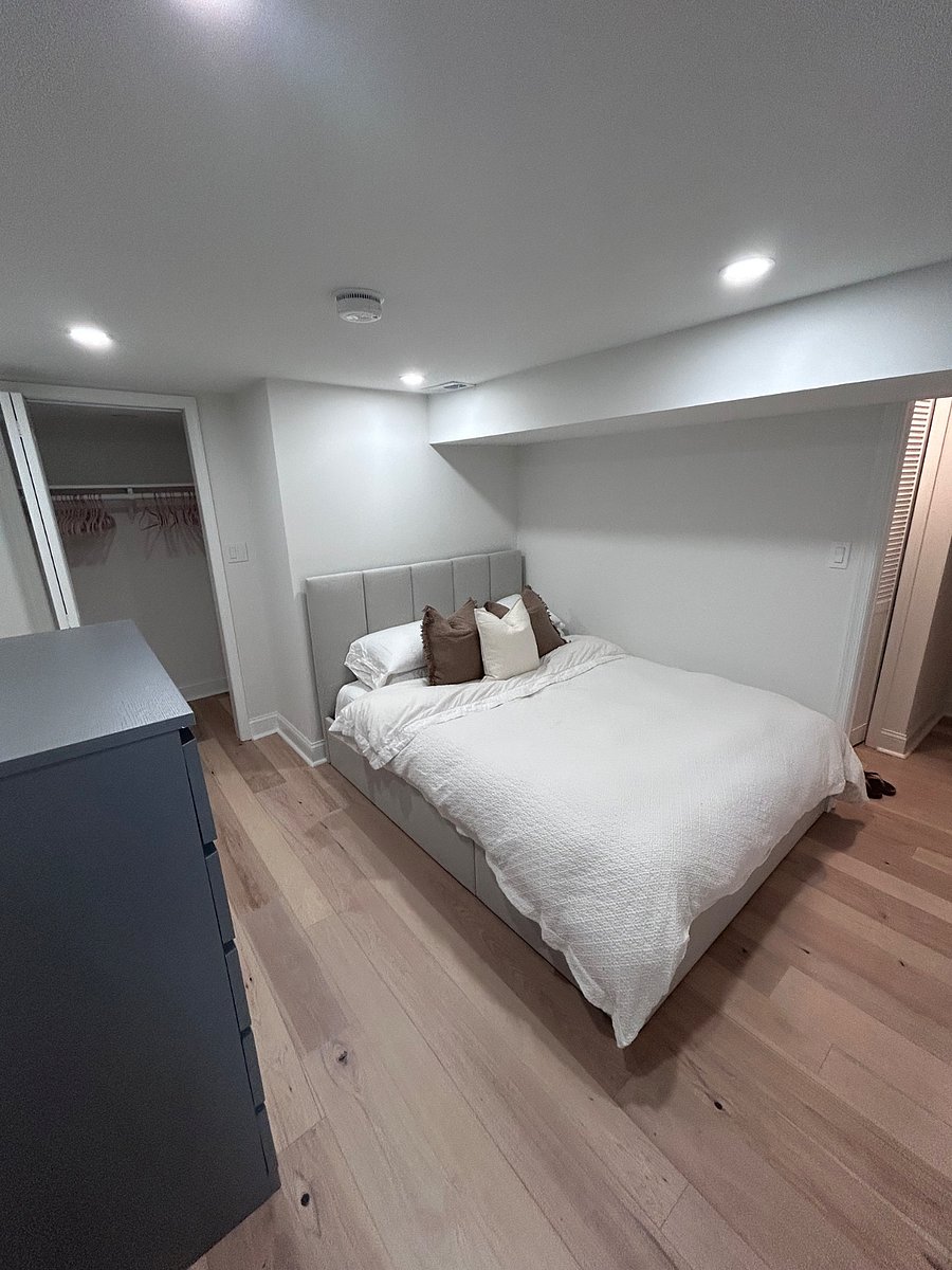 Comfortable Queen Bed with 10 Memory Foam Mattress. Rest easy in this cozy bedroom featuring a spacious closet, ample dresser storage, and hidden under-bed storage with a hydraulic lift for added convenience.