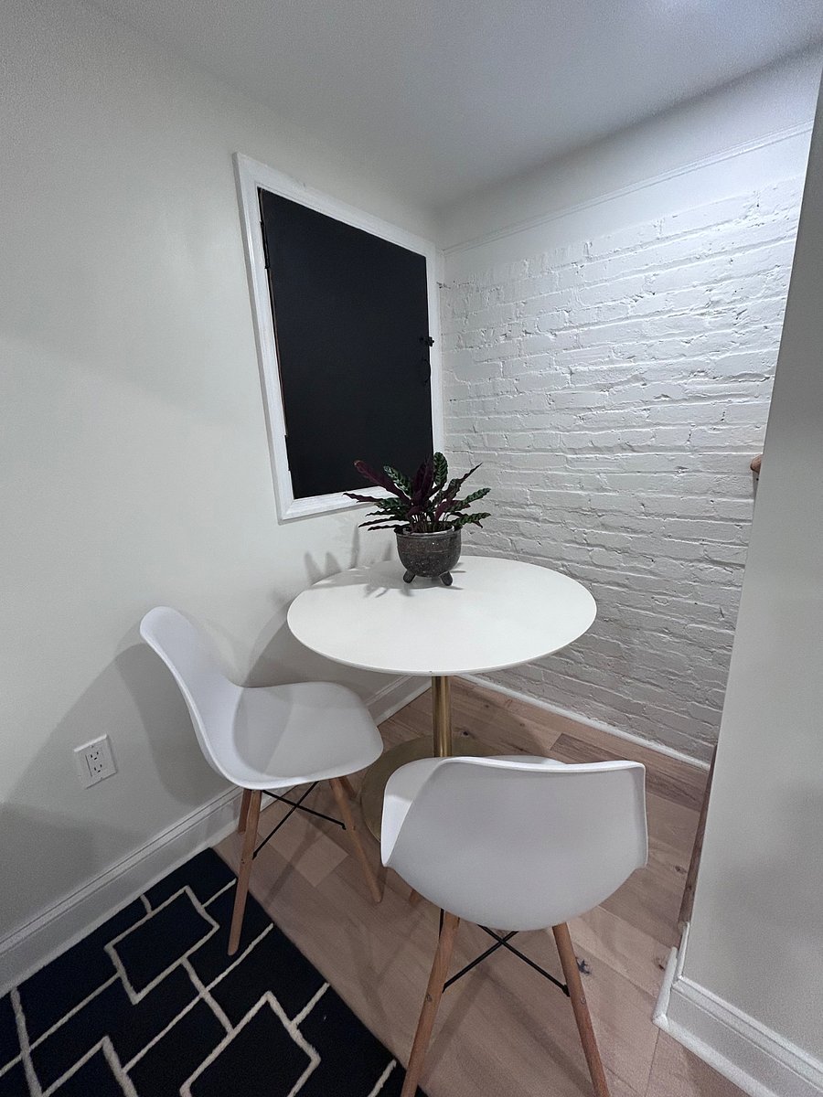 The dining table also serves as a functional workspace, perfect for any work-from-home day.