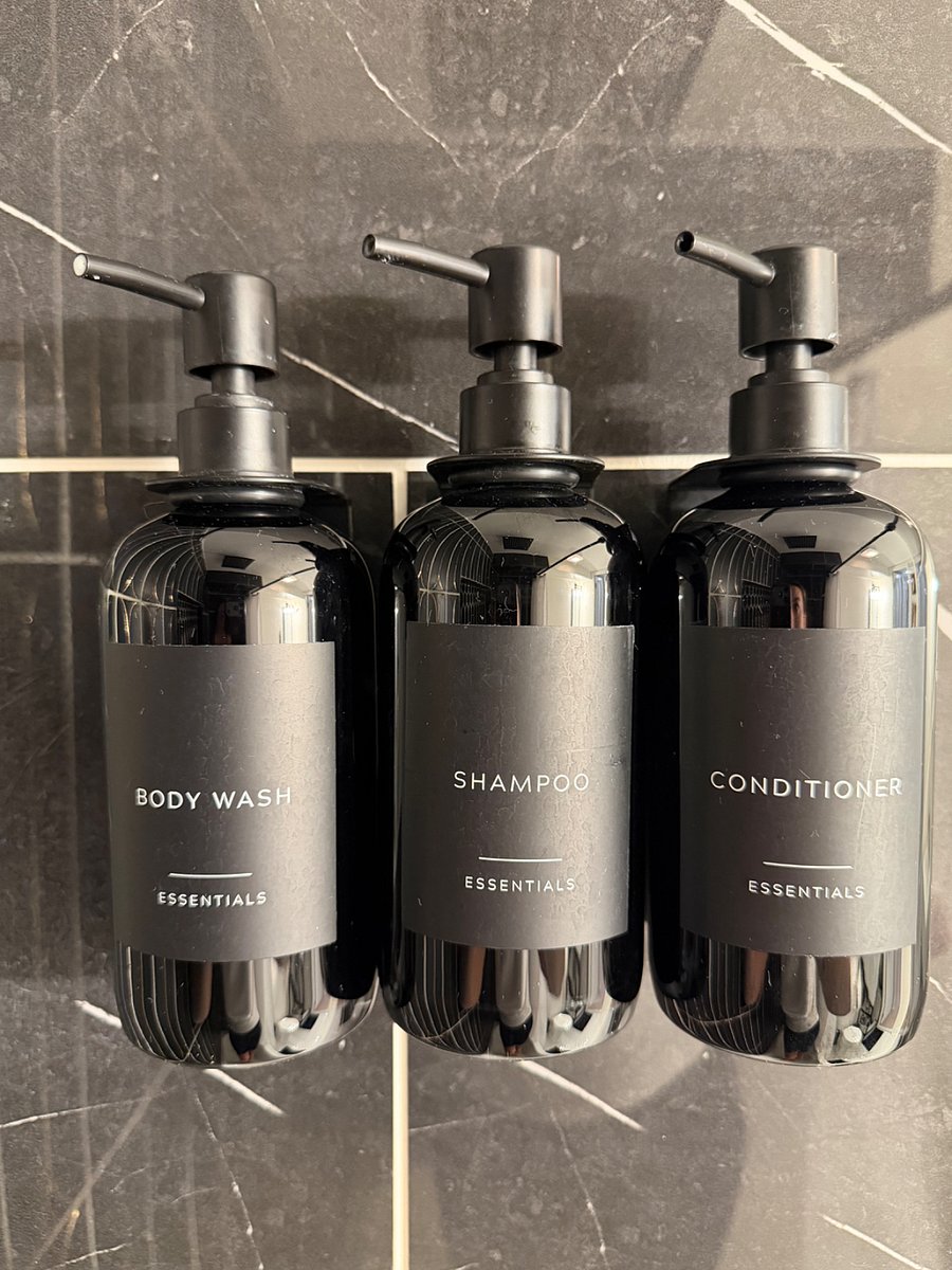 Bathroom amenities include hair dryer and cleaning products.