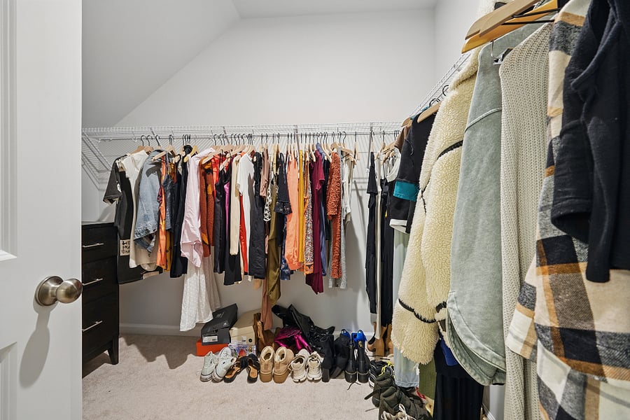 1 of 2 Primary Bedroom walk-in closets