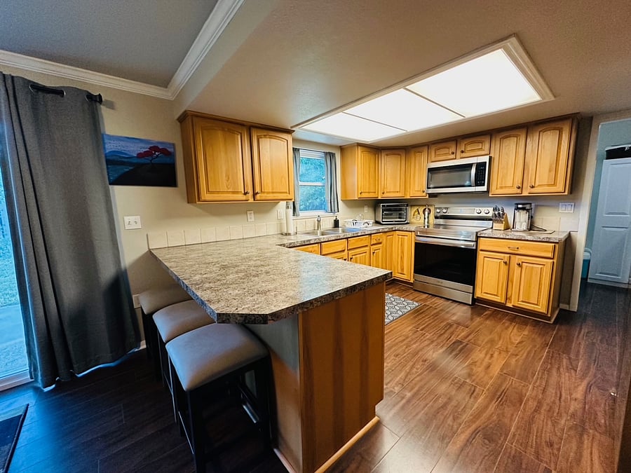Bright and functional kitchen with all new appliances and Ninja Foodi Airfryer